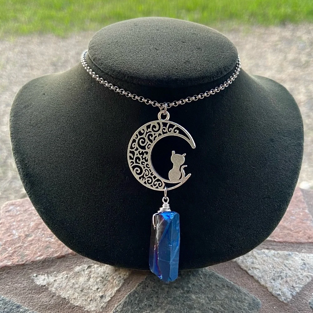 Crystal cat moon necklace . Dark blue titanium aura crystal & cat moon charm